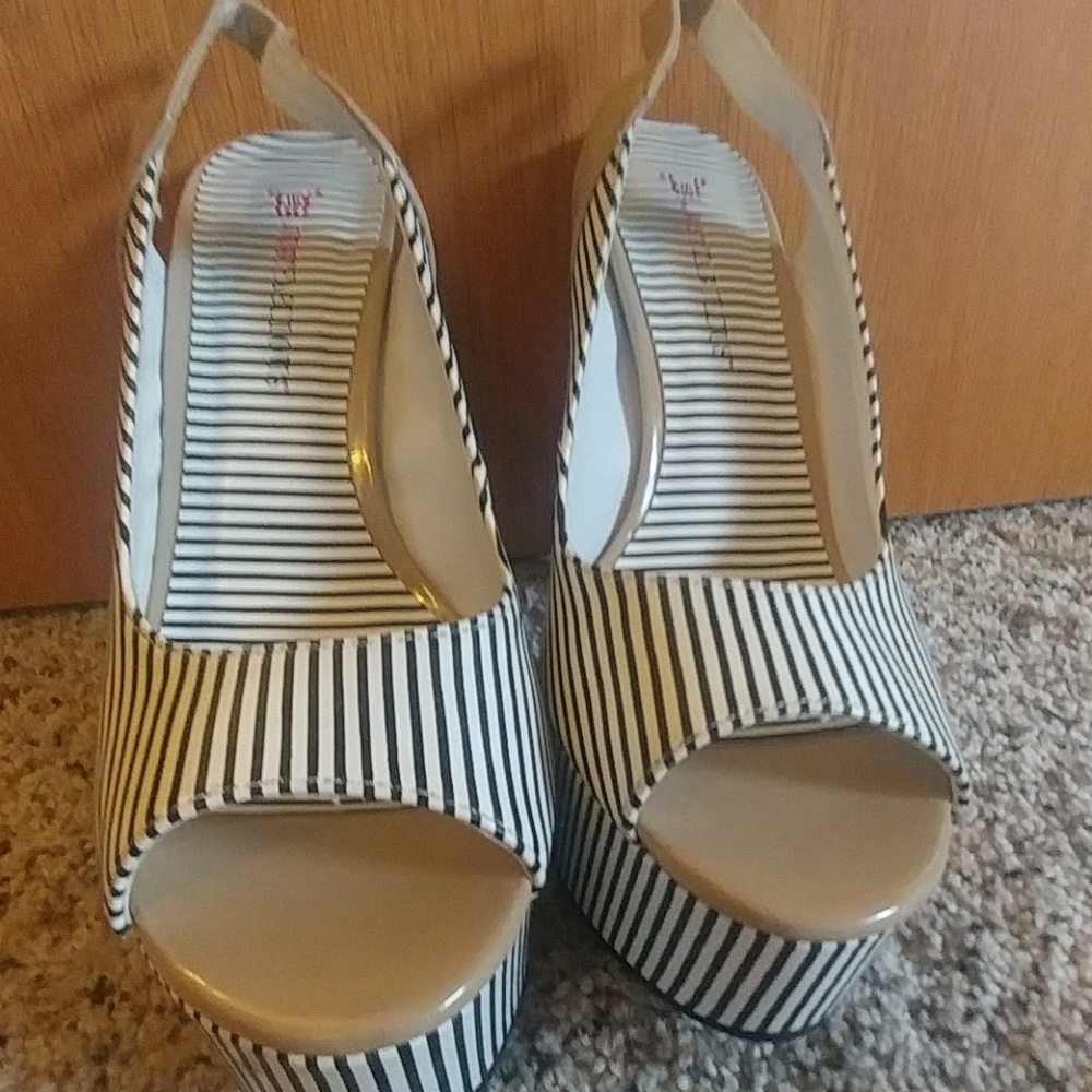Black and white striped platforms